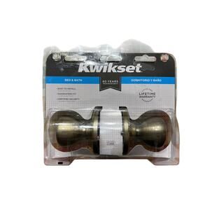 Kwikset Tylo Antique Brass Interior Bed/Bath Privacy Door Knob